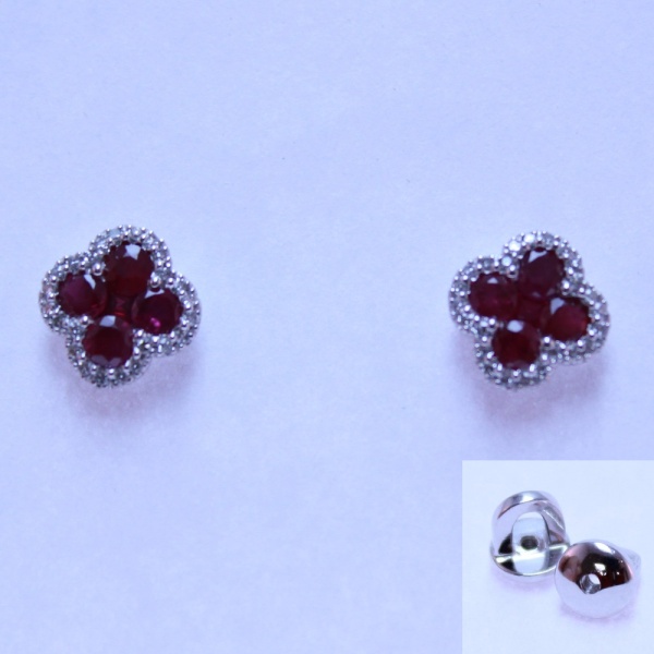 Серьги пусеты из белого золота с рубинами и бриллиантами